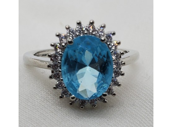 Size 8 Elegant Silver Plated Ring With Aqua Colored Stone Surrounded By Faux Diamonds