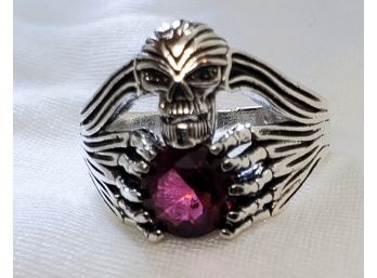 Size 11 Bike Style Silver Plated Ring With A Skull And Hands With A Faux Ruby