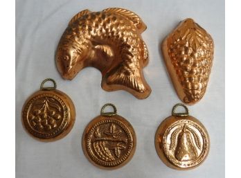 A Group Of 5 Copper & Brass Molds