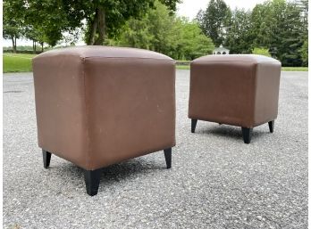 A Pair Of Leather Ottoman/Coffee Tables By Crate & Barrel