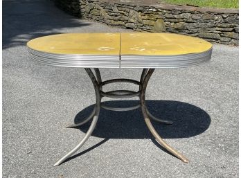 A Vintage 1950's Formica And Chrome Extendable Dining Table