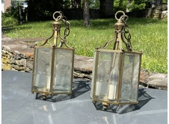 A Pair Of Large Glass And Brass Hanging Lanterns