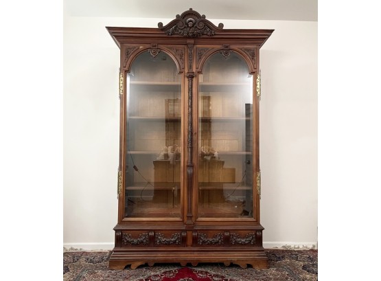 A Massive 19th Century Carved And Paneled Mahogany Beveled Glass China Cabinet