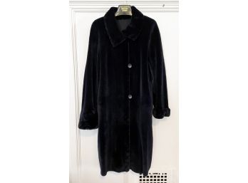 A Ladies Suede And Shearling Reversible Coat From Bergdorf Goodman