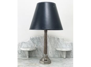 An Antique Polished Alloy Column Form Lamp