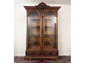 A Massive 19th Century Carved And Paneled Mahogany Beveled Glass China Cabinet