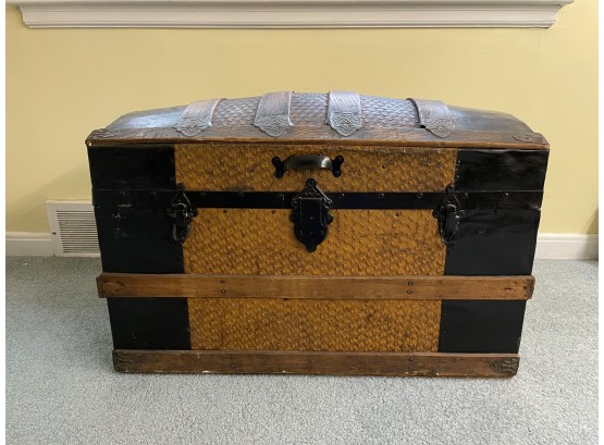 Antique Dome Top Trunk With Embossed Metal And Imbedded Casters