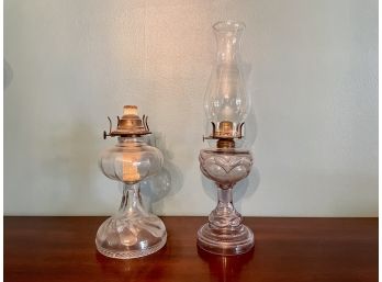 Pair Of Glass Oil Lamps, One With Pale Lilac Hue
