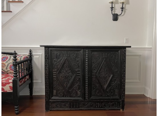 Antique Indonesian Ebonized Cabinet With Carved Diamond Motif And Scrolls
