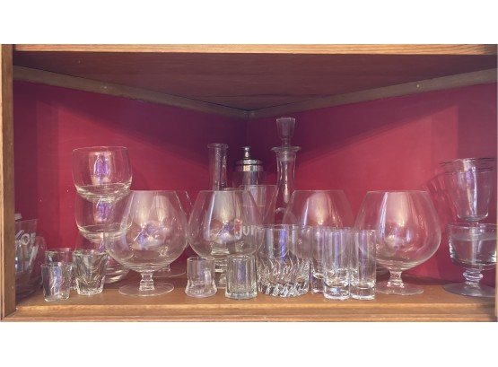 Corner Cupboard Shelf Of Glasses Lot #4 Includes Two Decanters And A Cocktail Shaker