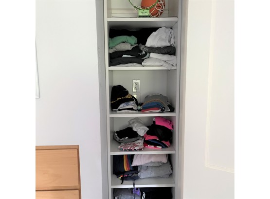 A Closet Shelving System - Hanging On Wall Mounted Bar - A