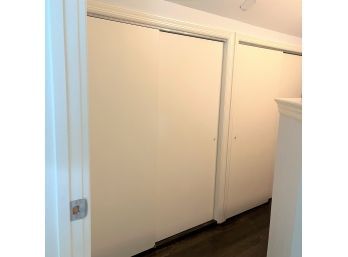 A Pair Of Hollow Core Wood Sliding Doors On Track - Storage Passageway