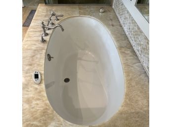 An Onyx Surround Platform And Bain Ultra - Champagne Bubble Air Jet Tub - Primary