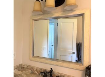 A Wall Mounted Mirror - Bathroom
