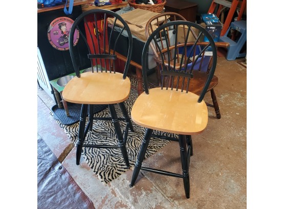 Two Painted Black Swivel Seat Bar Stools With Natural  Wood Tone Seats