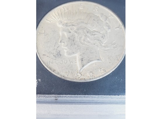 1925 Peace Dollar UNC  Slabbed Silver