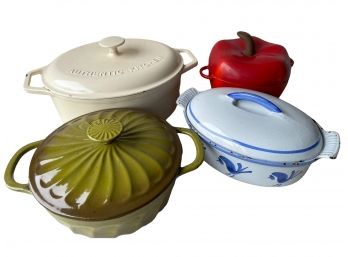 Collection Of Four Cast Iron Dutch Oven Cookware.