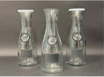 A Trio Of Carafes With Chalkboard Labels