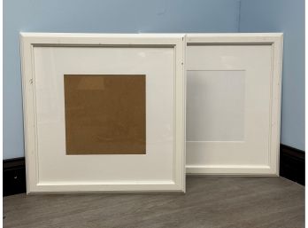 A Pair Of Simple White Picture Frames