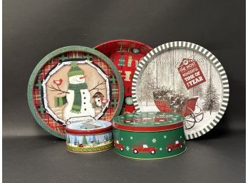 An Assortment Of Holiday Tins & Trays