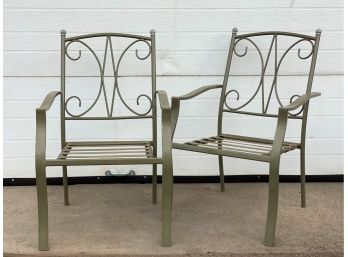 A Pair Of Stacking Outdoor Chairs