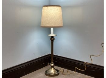 A Buffet Lamp With A Linen Shade
