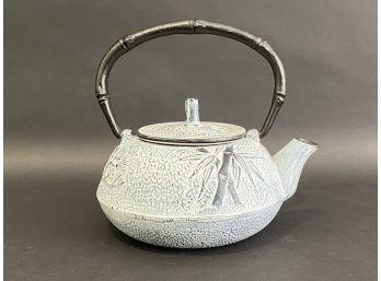 A Cast-Metal Tea Pot With A Bamboo Motif