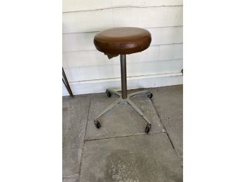 A Vintage Rolling Chrome And Vinyl Stool