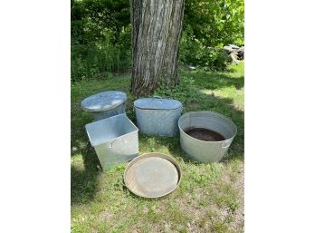 A Collection Of Galvanized Tubs And Pots