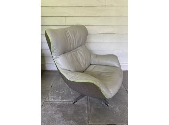 An Arie Duo Upholstered Swivel Chair From Canada
