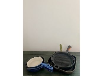 A Lot Of High Quality Iron Skillets And Grill Pans