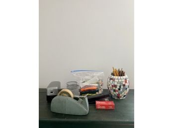 A Lot Of Desk Accessories With Vintage Stapler And Mosaic Pencil Jar