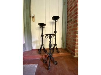 A Trio Of Mid Century Heavy Wrought Iron Floor Candle Holders