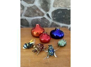 A Colorful Glass Lot With 3 Bud Vases And 4 Insect Ornaments