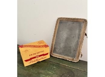 An Antique School Slate With Chalk