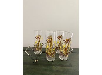 A Set Of 5 Vintage Mid Century Monkey And Giraffe Novelty Glasses In Wire Rack