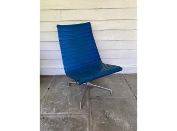 A Chrome And Blue Vinyl Herman Miller Aluminum Group Swivel Chair