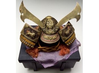 ORNATE MINIATURE SAMURAI HELMET IN WOODEN CASE: Foo Dog And Brass Decoration, Japanese, Black Wooden Box,