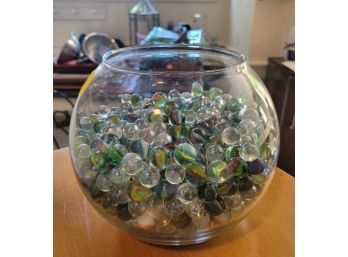 A Bowl Full Of Vintage Marbles With A Variety Of Types & Colors