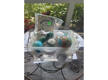 Assorted Arrangement Of Different Globes And Juggling Kit