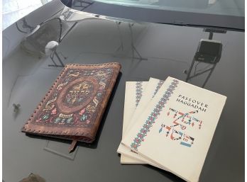 Three Passover Haggadahs And Leather Cover