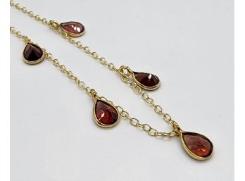 Garnet Necklace In 14k Yellow Gold Over Sterling