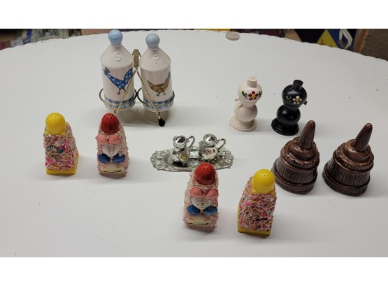 Collection Of Unique Salt And Pepper Shakers.  B4
