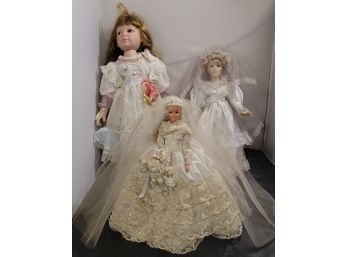 Set Of Three Wedding Dressed Dolls.   E1