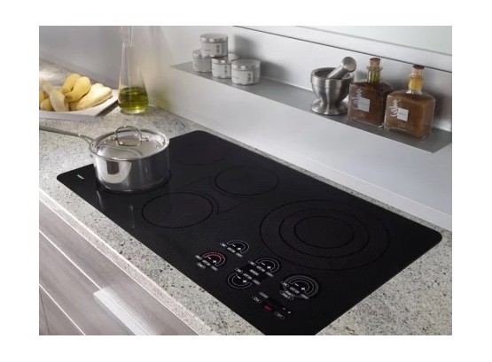 A Wolf CT36EU Electric Unframed Cooktop - Barely Used