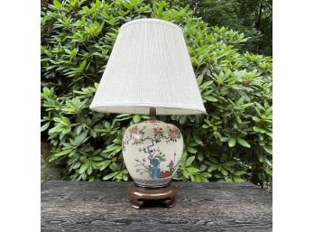 An Asian Inspired Porcelain Crackle Glaze Lamp On Rosewood Base