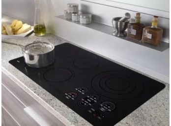 A Wolf CT36EU Electric Unframed Cooktop - Barely Used