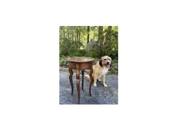 A Small Round Occasional Table In Dark Wood - Pup Not Included
