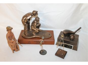 Collection Of Golf Related Awards And Figurines