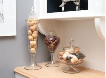 Trio Of Glass Canisters With Decorative Fruits And Nuts